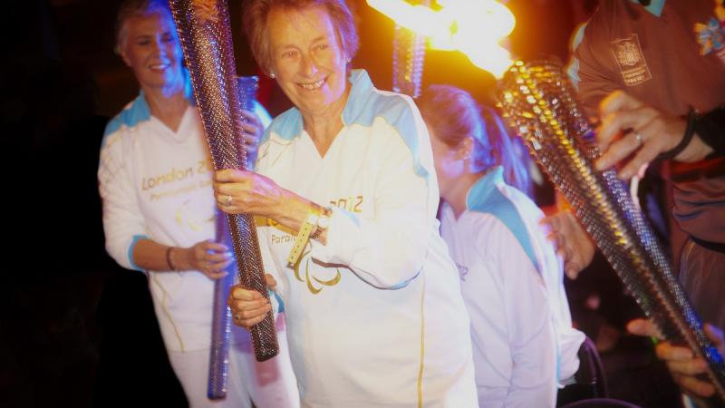 Eva Loeffler, daughter of Sir Ludwig Guttman, taking part in the London 2012 Paralympic Torch Relay.