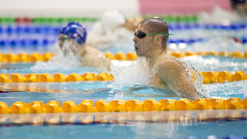 Marc Evers and Scott Quin competing in the Men's 100m Breaststroke SB14 at the 2015 IPC Swimming World Championships in Glasgow