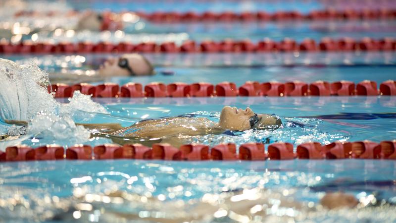 Swimmers doing backstroke