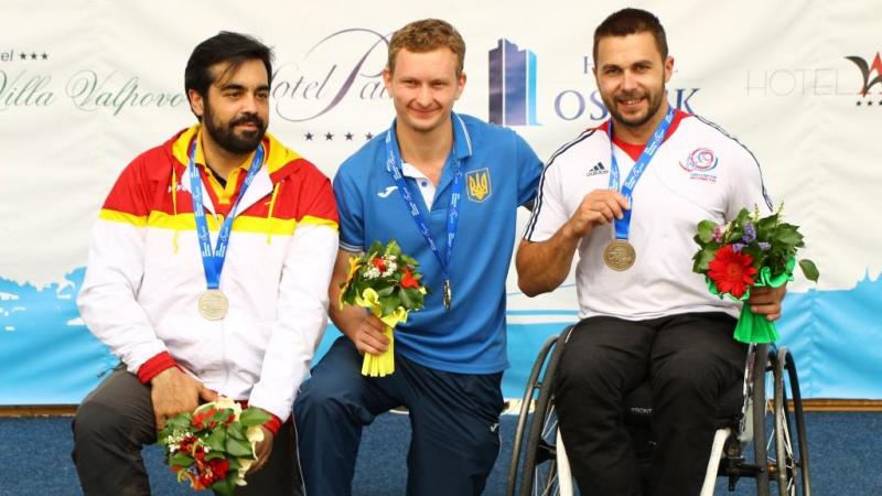 Ukraine’s Andrii Doroshenko wins gold in the R6, beating Spain’s Juan Antonio Saavedra Reinaldo and Great Britain’s Matt Skelhon at the IPC Shooting World Cup on 14 July in Osijek, Croatia.