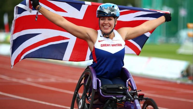Hannah Cockroft of Great Britain celebrates after winning the womens 800m T34 final during day four of the IPC Athletics European Championships in Swansea.