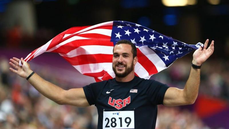 Jeremy Campbell of the United States celebrates winning gold in the Men's Discus Throw - F44 Final on day 8 of the London 2012 Paralympic Games.