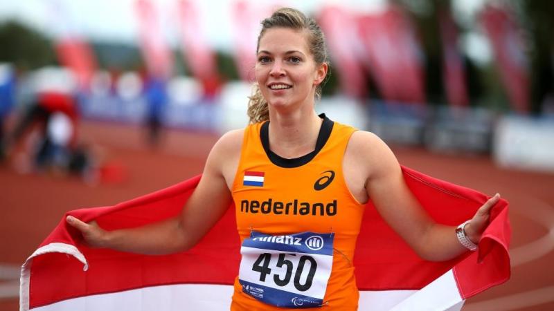 Marlou van Rhijn celebrates after winning the womens 200m T44 final during day three of the IPC Athletics European Championships at Swansea