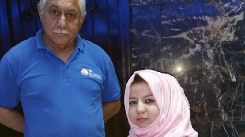 Zahraa Al-Maliki with her coach.