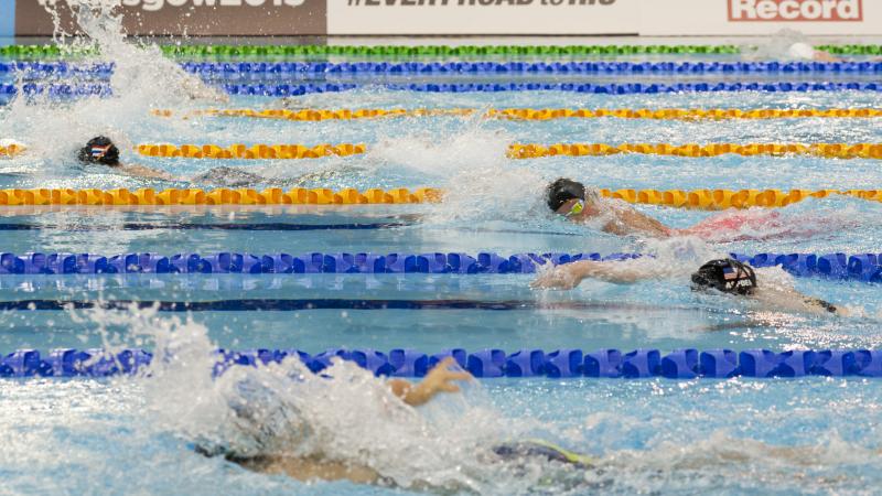 Athletes competing in the Women's 400m Freestyle S9 at the 2015 IPC Swimming World Championships in Glasgow.