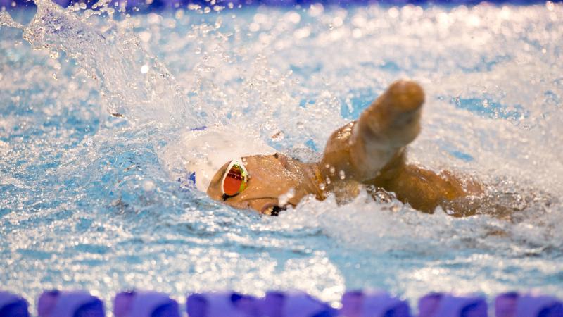 Swimmer with arm amputation