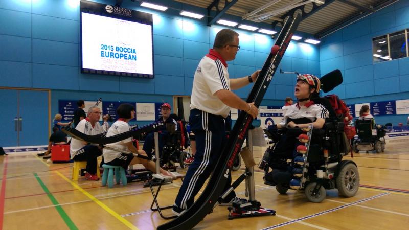 Man in electric wheelchair on a boccia field of play