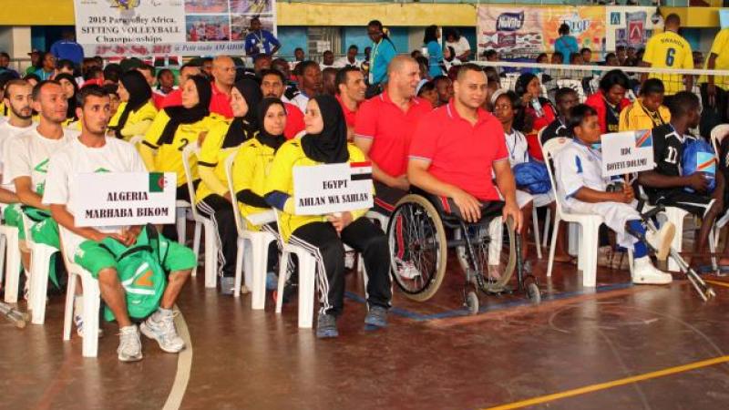 Athletes line up during a ceremony. 