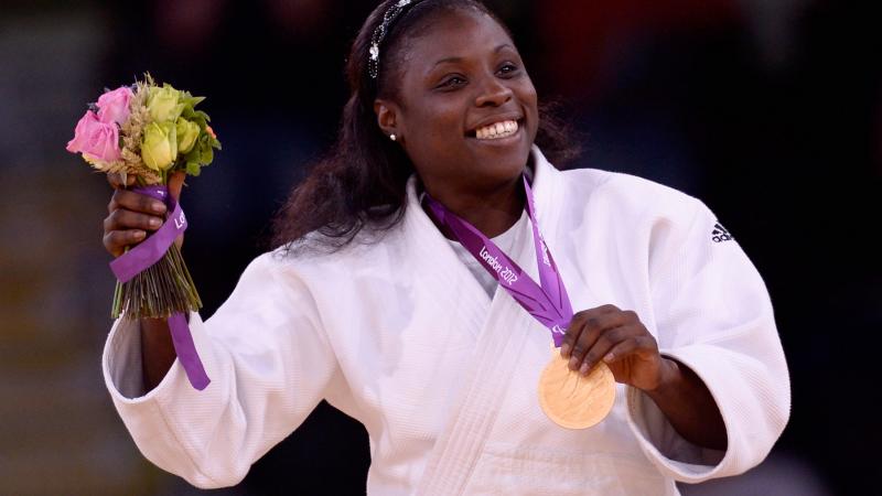 Cuba's Dalidaivis Rodriguez Clark celebrates after winning the women's -63kg judo gold medal contest at the London 2012 Paralympic Games.