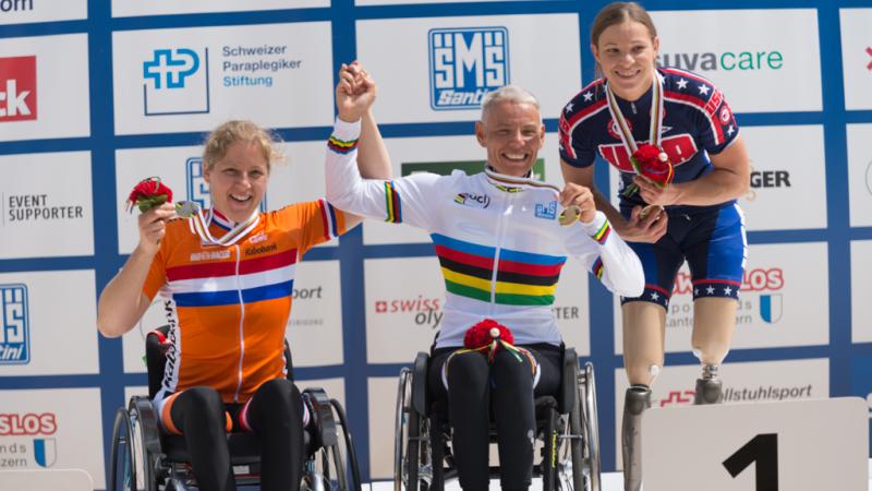 Three women on the podium