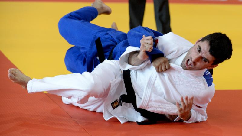 Two judoka on the mat