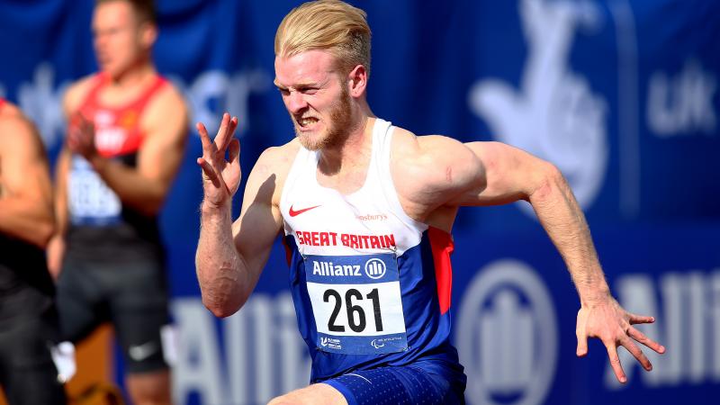 Man with British flag celebrating