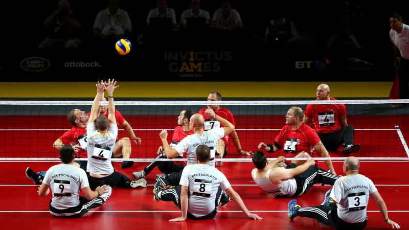 Michael Frenzke of Germany competes in the Sitting Volleyball 5th/6th Place Playoff between Denmark and Germany at the Copper Box Arena on day four of the Invictus Games.