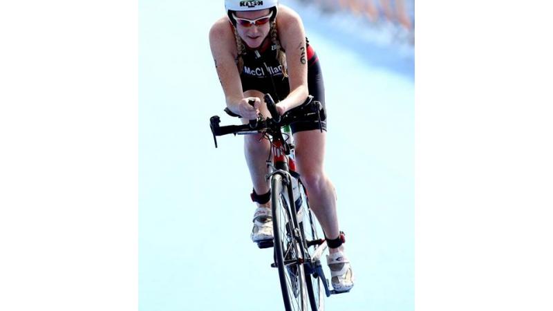 Faye McClelland #26 of Great Britain competes in the cycling portion of the womens PT4 class during the Aquece Rio Paratriathlon at Copacabana beach.