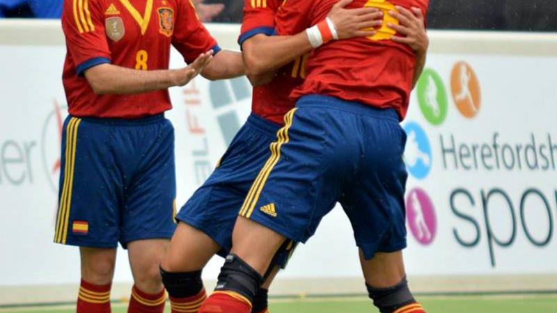 Spanish players celebrate a goal.