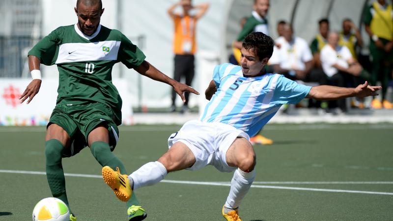 Two men playing football