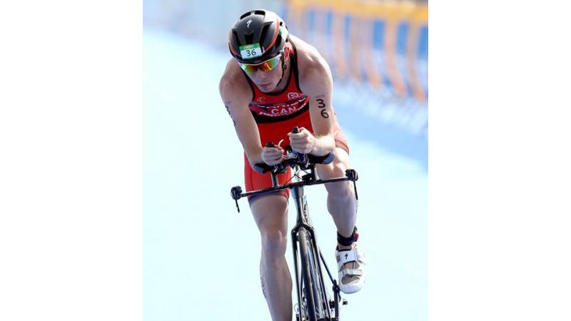 Stefan Daniel of Canada competes in the cycling portion of the men's PT4 class during the Aquece Rio Paratriathlon at Copacabana beach on August 1, 2015 in Rio de Janeiro, Brazil.