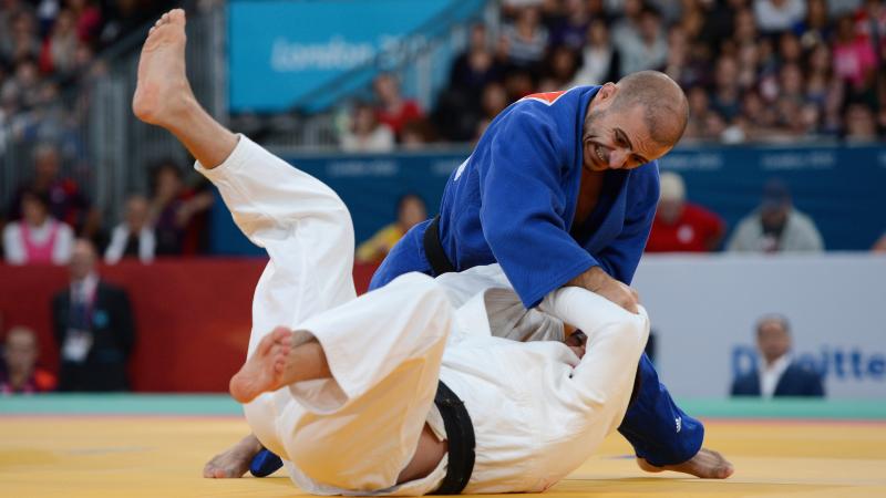 Two men practising judo