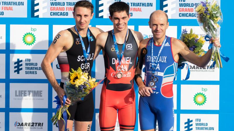 Podium with three men