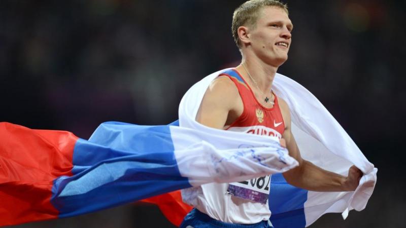 Evgenii Shvetcov of Russia celbrates winning gold in the Men's 100m - T36 Final at the London 2012 Paralympic Games.