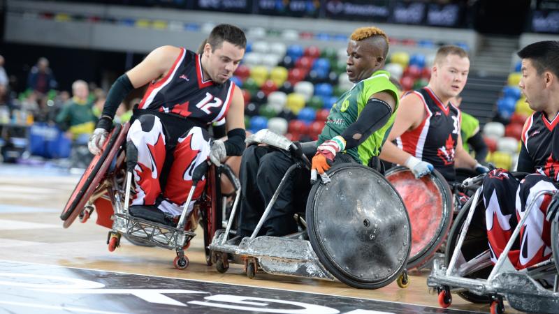 Wheelchair rugby players in action