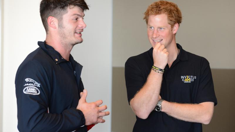 British sprinter Dave Henson meets Prince Harry at the 2014 Invictus Games.
