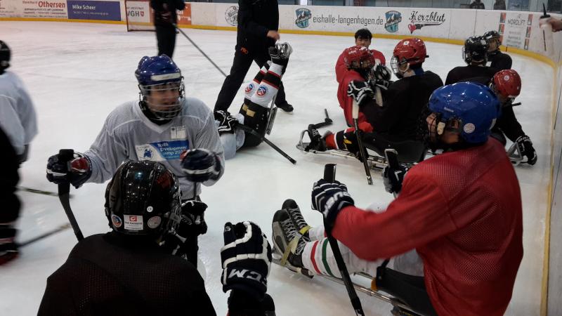 Ice sledge hockey players on the ice