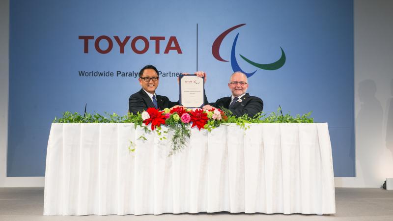 Toyota President Akio Toyoda and International Paralympic Committee President Sir Philip Craven at the official signing ceremony for the Worldwide Paralympic Partnership in November 2015.