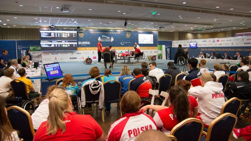 The crowd watches on as a powerlifter attempt a lift