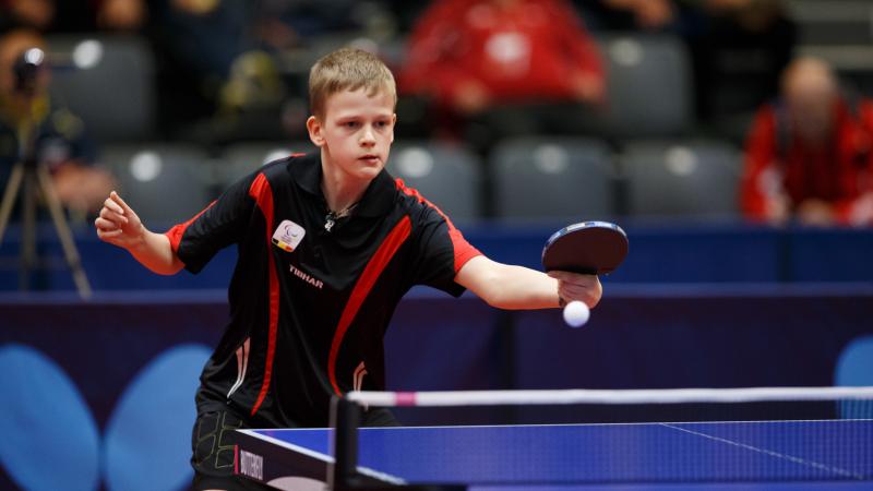 Man plays table tennis