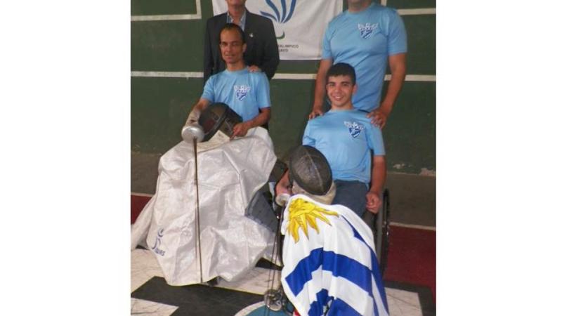 Wheelchair fencing athletes of Uruguay received their new IWAS fencing aprons.