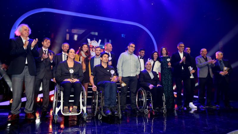 Group shot of people with and without wheelchairs