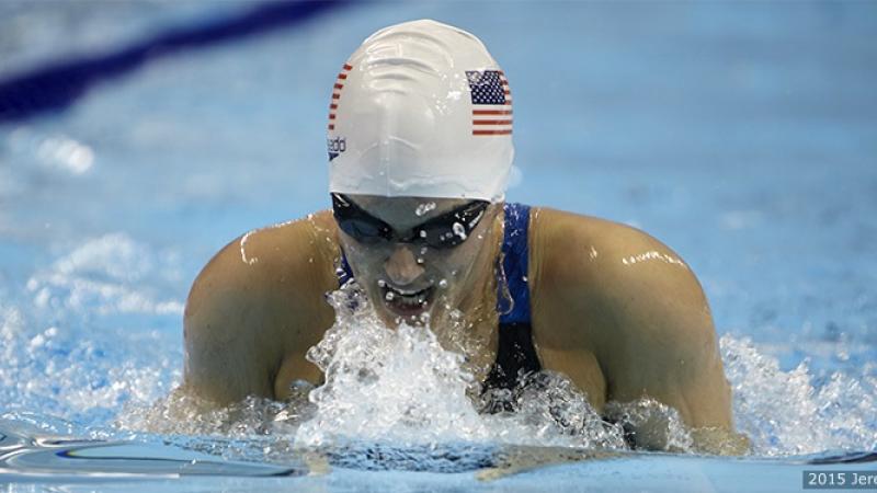 A female swimmer doing breaststroke