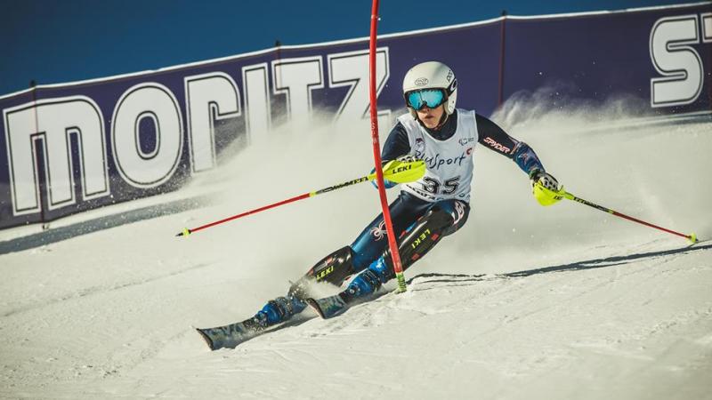 Men's standing skier Thomas Walsh of the USA tackles a gate during slalom