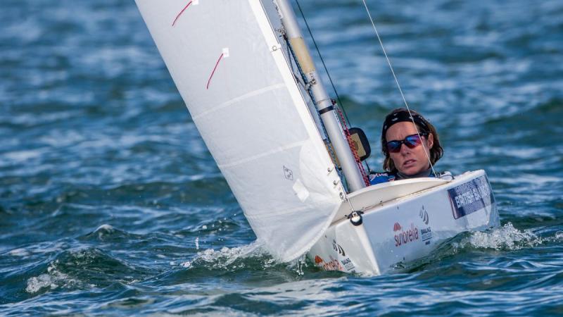 Woman in sailing boat.