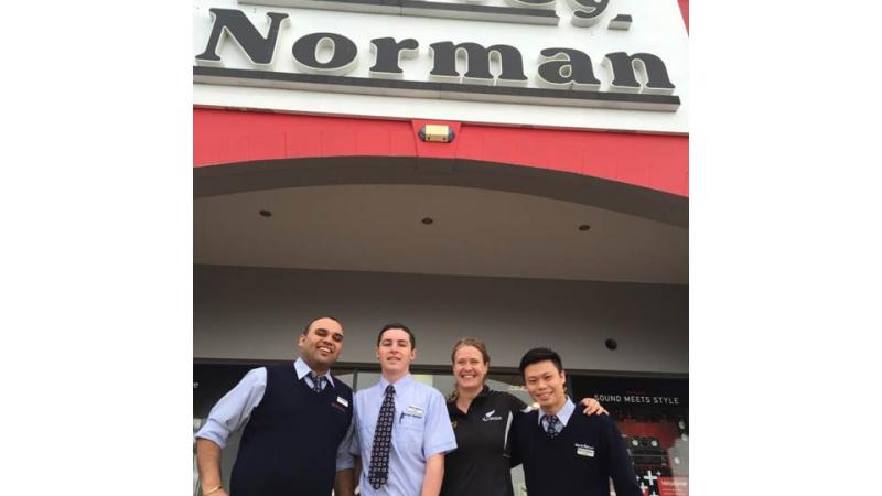 Fiona Allan, Chief Executive, PNZ, with members of the Harvey Norman's team.