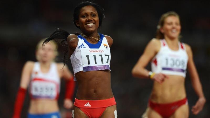 Yunidis Castillo of Cuba celebrates as she wins gold in the Women's 100m T46 Final at the London 2012 Paralympic Games.