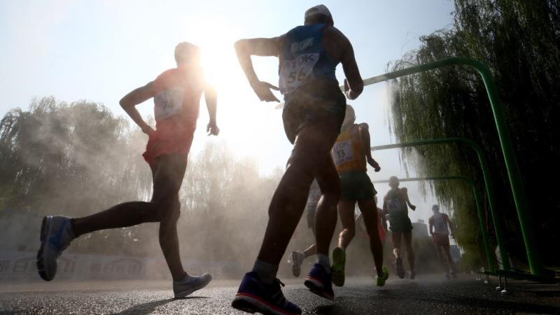 Runners enter a cooling station 