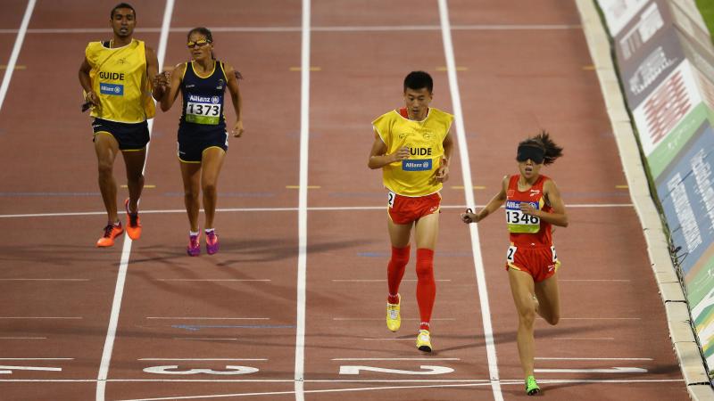 China's Jin Zheng celebrates winning the women's 1500m T11 final during the 2015 IPC Athletics World Championships.