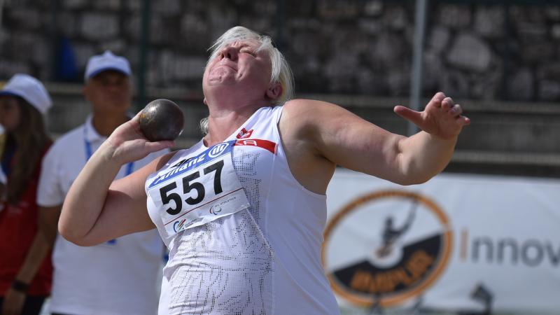 Woman during a shot put