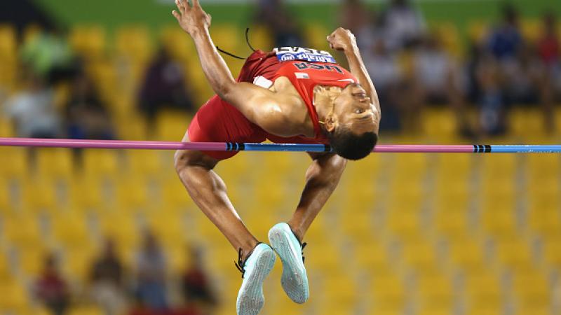 Man doing high jump