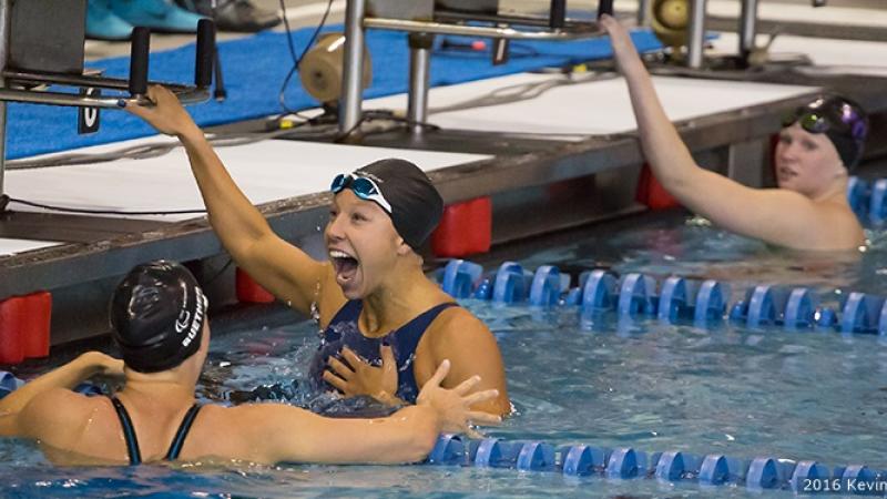 A Para swimmer celebrates a new world record