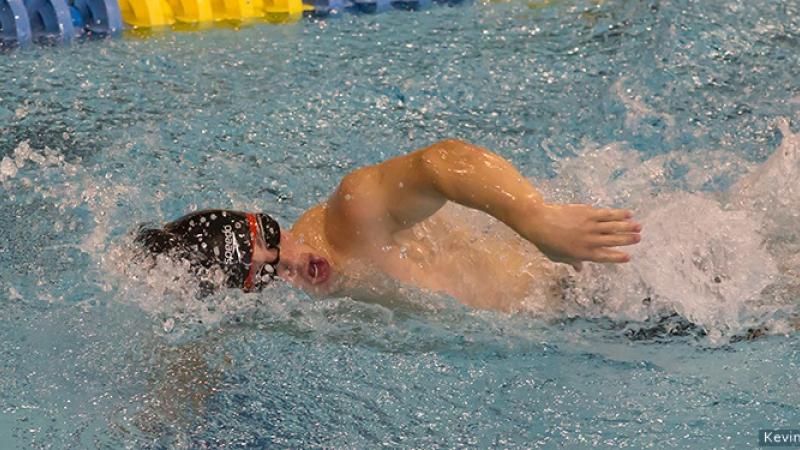 A Para swimmer competes in a race