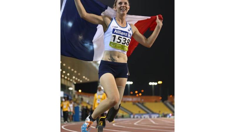 Marie-Amelie Le Fur of France celebrates winning the women's 400m T44 final during the Evening Session at the IPC Athletics World Championships in Doha, Qatar.