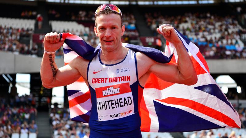 Great Britain's Richard Whitehead celebrates after setting a new world record in the men's 200m T42 at the 2016 IPC Athletics Grand Prix Final at The Stadium - Queen Elizabeth Olympic Park.