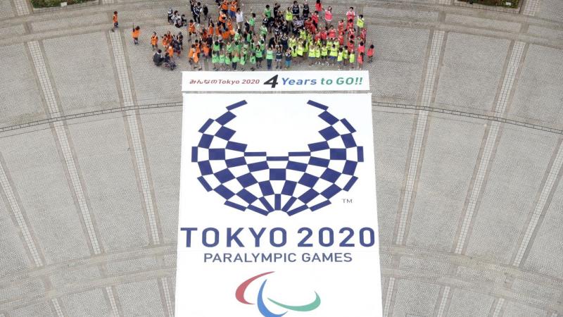 A Tokyo 2020 emblem can be seen from up.