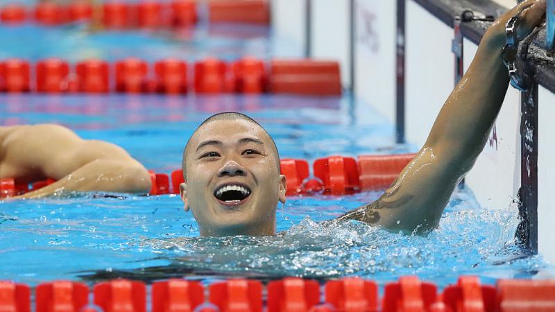 Pan Shiyun of China celebrates winning the gold medal