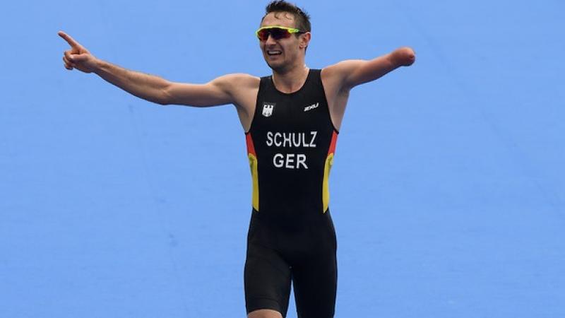 Martin Schulz GER approaches the finish line to win the Gold Medal in the Men's PT4 Triathlon competition.