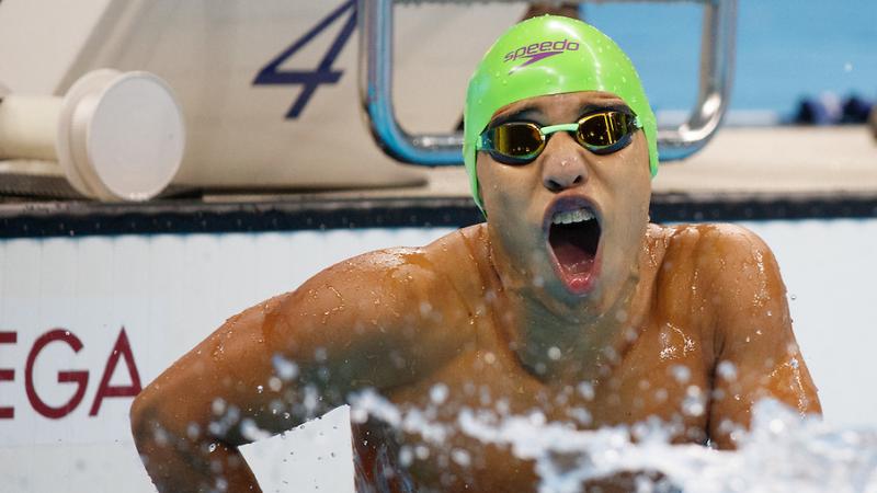 Carlos Serrano Zarate COL takes the Gold Medal in a new World Record time in the Men's 100m Breaststroke.
