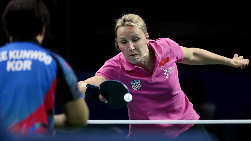 Sandra Paovic of Croatia in action against Kunwoo Lee during the prelimimary round of the Women's's Table Tennis at the Rio 2016 Paralympic Games.